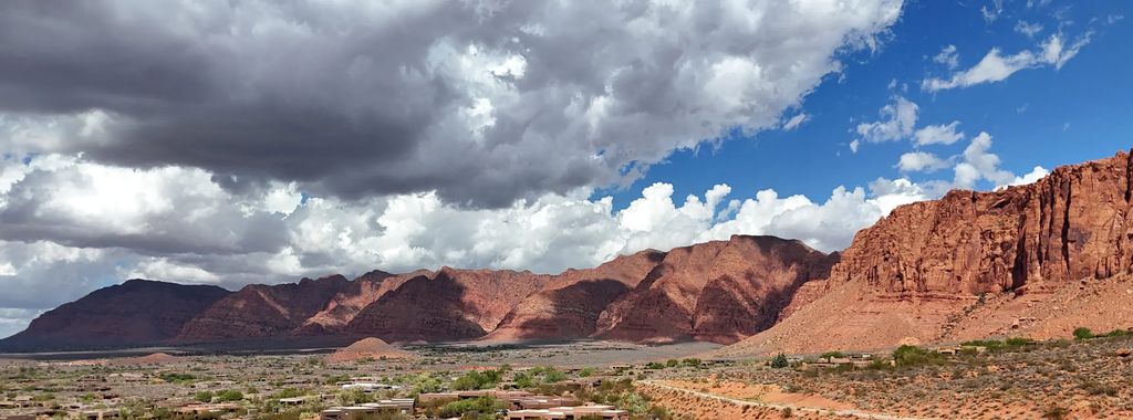 Panorama of the red cliffs above Ivins, Utah